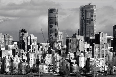 Modern buildings in city against sky