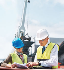 Rear view of man working at construction site