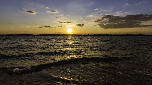 Scenic view of sea against sky during sunset