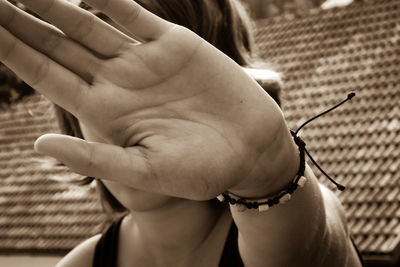 Close-up of woman holding hands