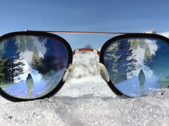 Close-up of sunglasses on ice