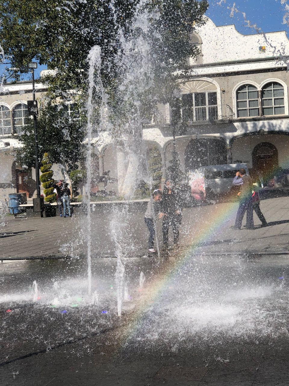 WATER SPLASHING ON FOUNTAIN IN CITY