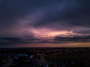 High angle view of townscape against sky at sunset