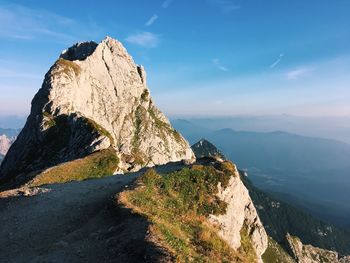 Rock formations on mountain against sky