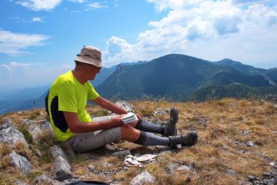 Portrait of senior man hiking in velebit mountain, croatia