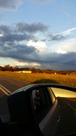 Cropped image of car on road