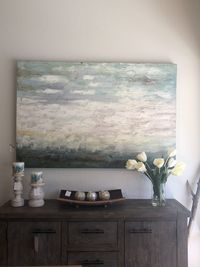 Flower vase on table at home