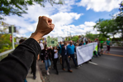 Group of people against the sky