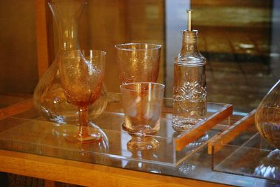 Close-up of wine glasses on table in restaurant