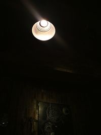Low angle view of illuminated lamp