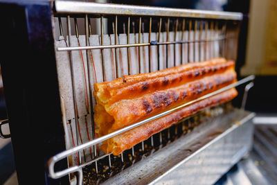 Close-up of meat on barbecue grill