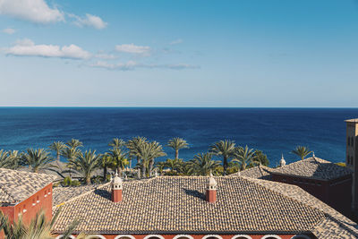 Looking out to sea over the resort roofs