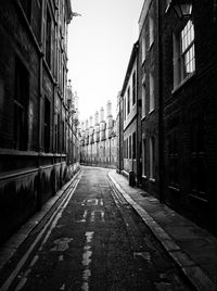 Narrow road along buildings