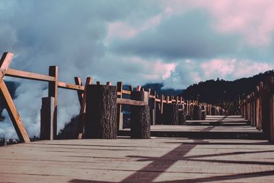 View of bridge against cloudy sky