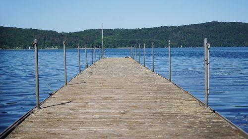 Pier over sea against sky