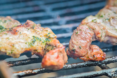 Close-up of meat on barbecue grill