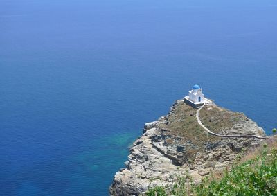 High angle view of church against calm blue sea