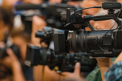 Public live event media coverage, television cameras at a press conference