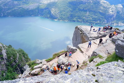 Tourists at preikestolen, the pulpit rock, norway