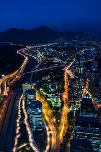 High angle view of illuminated city at night