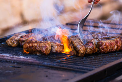 Close-up of meat on barbecue grill