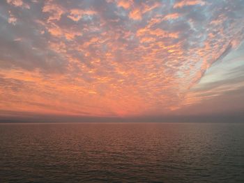 Scenic view of dramatic sky during sunset