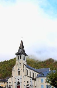 Low angle view of church against sky