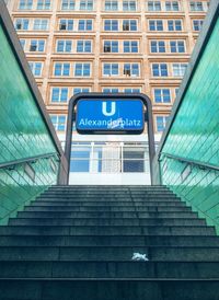 Low angle view of text on modern building