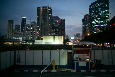 Illuminated buildings in city at night