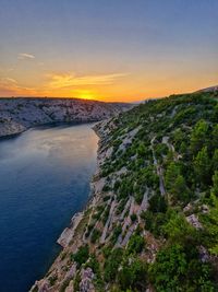 Scenic view of sea against sky during sunset