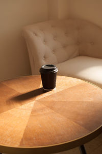 Close-up of coffee cup on table