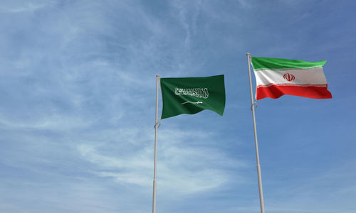 Low angle view of flag against sky