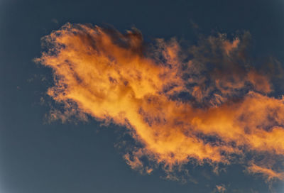 Low angle view of dramatic sky at sunset