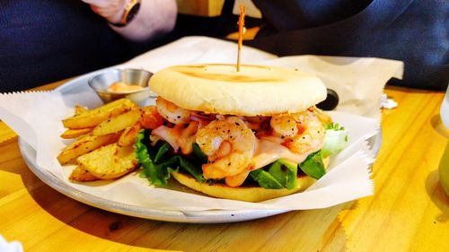 Close-up of burger in plate on table