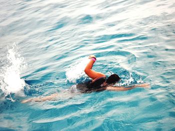 High angle view of person swimming in pool