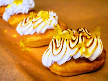 Close-up of eclairs on table