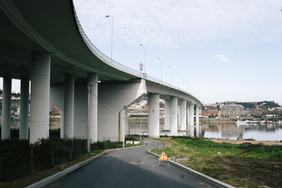 View of bridge against cloudy sky