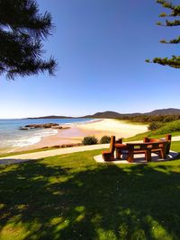 Scenic view of beach against clear sky