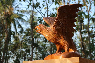 Low angle view of a bird statue