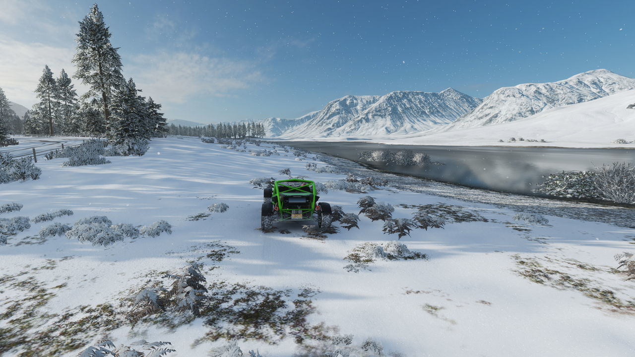 SNOW COVERED MOUNTAIN AGAINST SKY