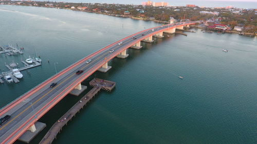 High angle view of harbor by sea against sky