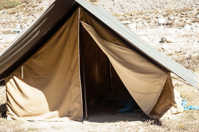 View of tent on field