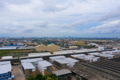 High angle view of buildings against sky