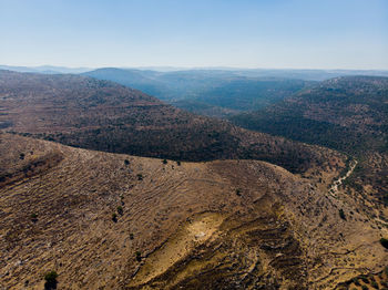 High angle view of mountains against clear sky