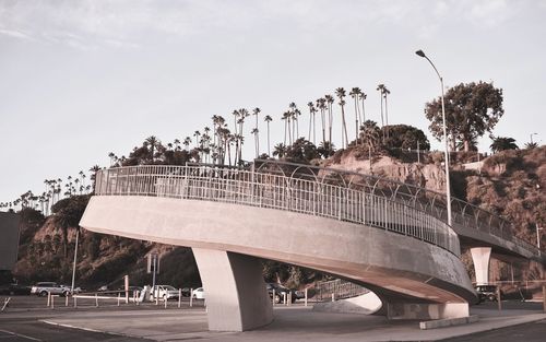 View of bridge against cloudy sky