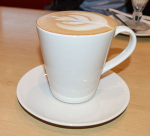 Close-up of coffee cup on table