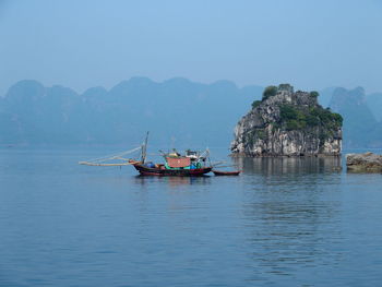 Boats sailing in sea