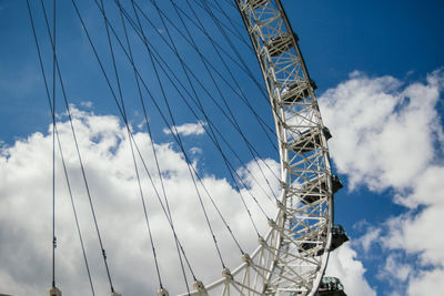 Low angle view of ferris wheel against sky