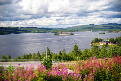 Scenic view of sea against cloudy sky