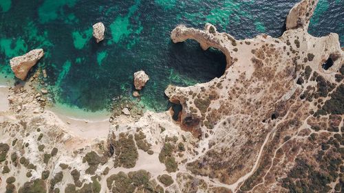 High angle view of rocks on beach